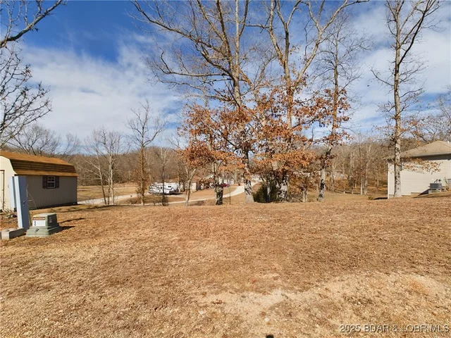 Primary bedroom — 107 Mayerling Drive Laurie Missouri real estate
