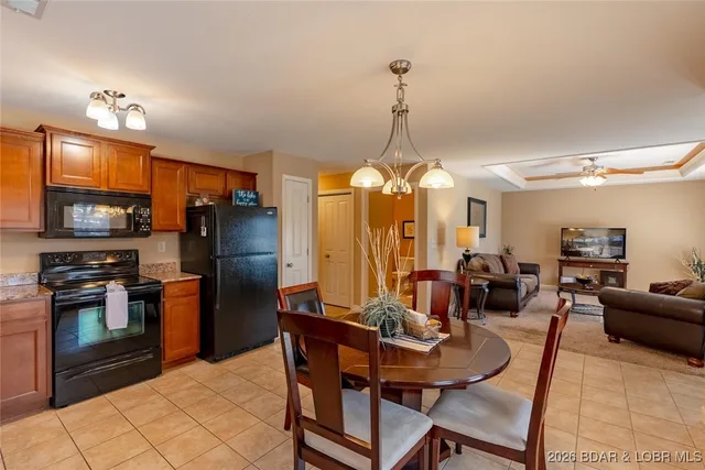 Primary bedroom — 50 Tom Watson Court Lake Ozark Missouri real estate