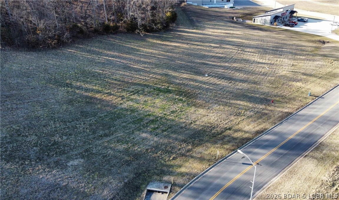 .8 +/- Acres Commercial Street Warsaw Missouri home for sale listed at $100,000