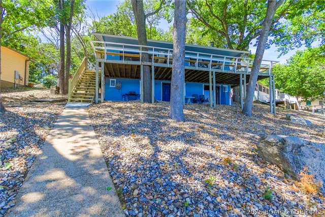 Primary bedroom — 110 Old English Point Sunrise Beach Missouri real estate