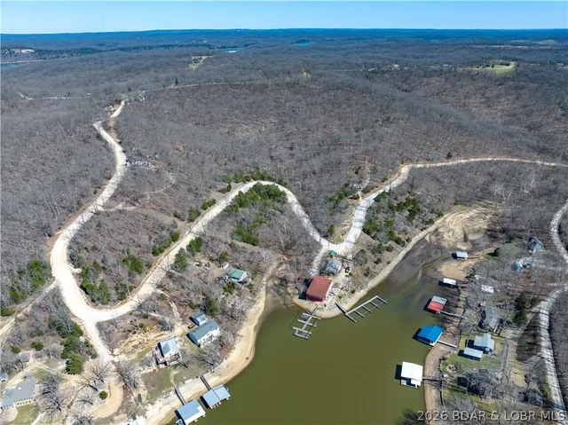 Primary bedroom — Central Ozarks Road Edwards Missouri real estate