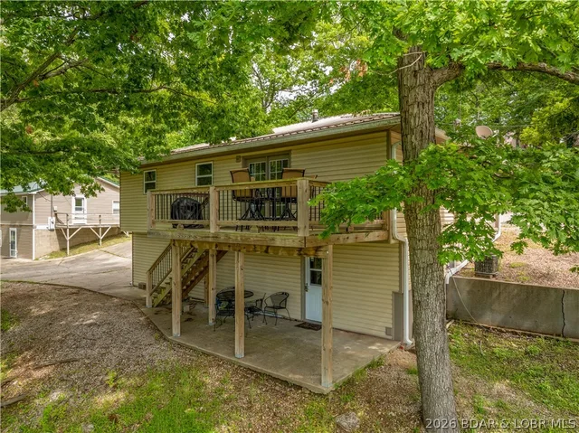 Primary bedroom — 25842 Old Oar House Road Warsaw Missouri real estate