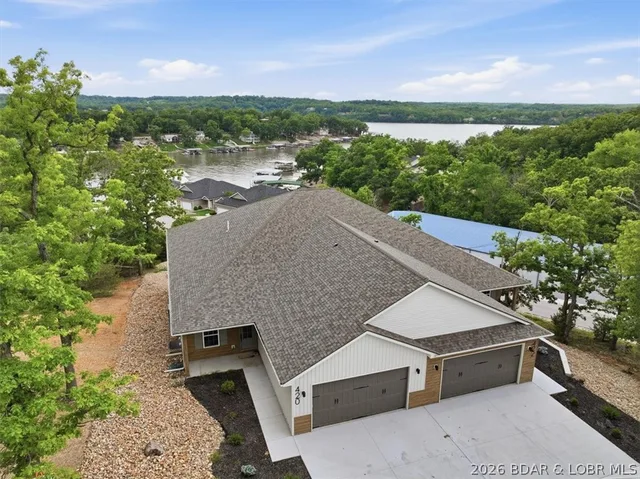 Primary bedroom — 420 Outer Drive Lake Ozark Missouri real estate