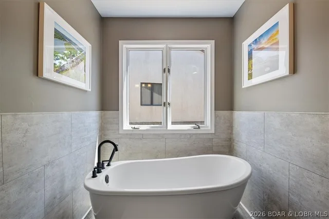 Primary bedroom — 576 Racquet Club Drive Lake Ozark Missouri real estate