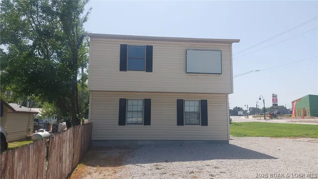 Primary bedroom — 939 Main Street E Warsaw Missouri real estate