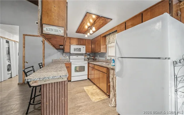 Primary bedroom — 228 Basswood Road Sunrise Beach Missouri real estate