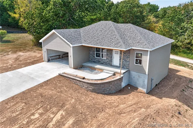 Front exterior — 107 Aspen Court Laurie Missouri real estate