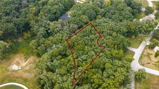 Primary bedroom — Lot 220 & 221 Cherry Hill Village Lake Ozark Missouri real estate