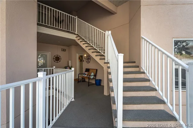 Primary bedroom — 44 Emerald Bay Court Lake Ozark Missouri real estate