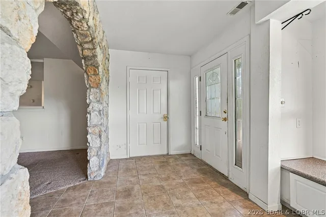 Primary bedroom — 970 Chateau Lane Osage Beach Missouri real estate