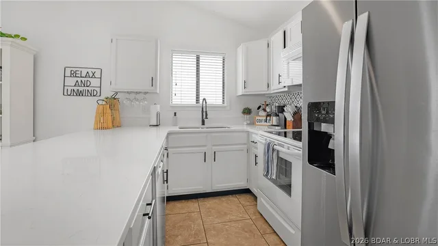 Primary bedroom — 150 Southwood Shores Drive Lake Ozark Missouri real estate
