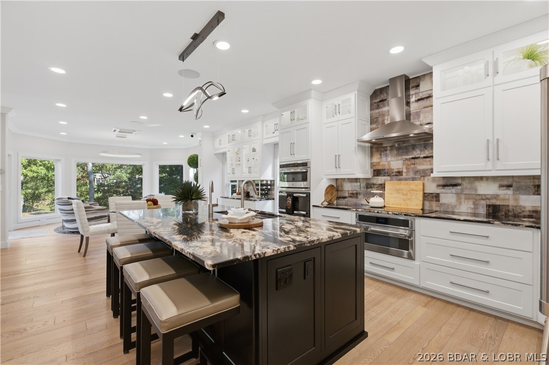 339 Cordoba Point Sunrise Beach Missouri 4 bedroom 4 bathroom home for sale listed at $1,400,000