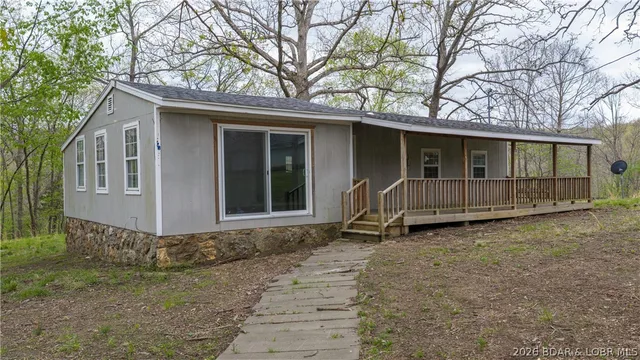 Front exterior — 1318 Sagrada Road Edwards Missouri real estate