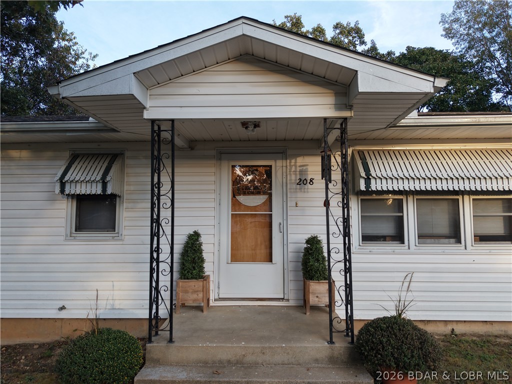 Primary bedroom — 208 South Hill Drive Stover Missouri real estate