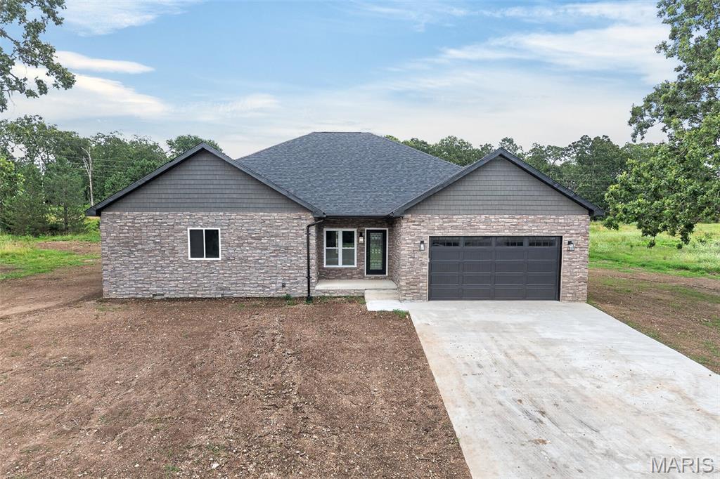 26780 Ontario Drive Lebanon Missouri 4 bedroom 3 bathroom home for sale listed at $409,900