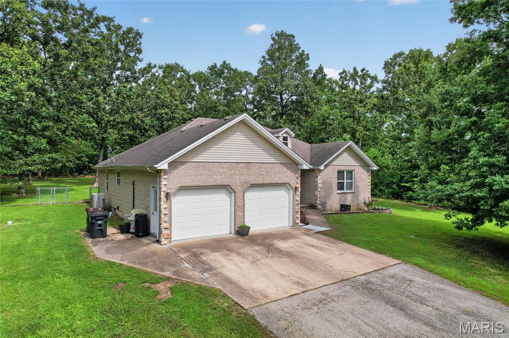 Front exterior — 24450 Remington Lane Lebanon Missouri real estate