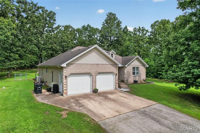 Front exterior — 24450 Remington Lane Lebanon Missouri real estate