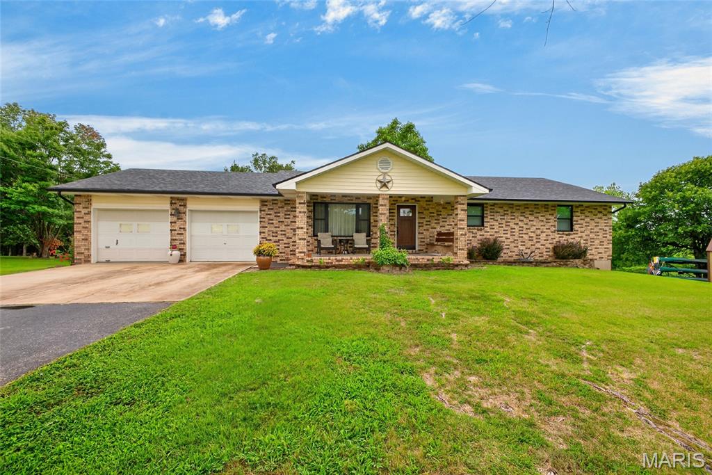 23301 Rainbow Lane Waynesville Missouri 4 bedroom 3 bathroom home for sale listed at $369,000