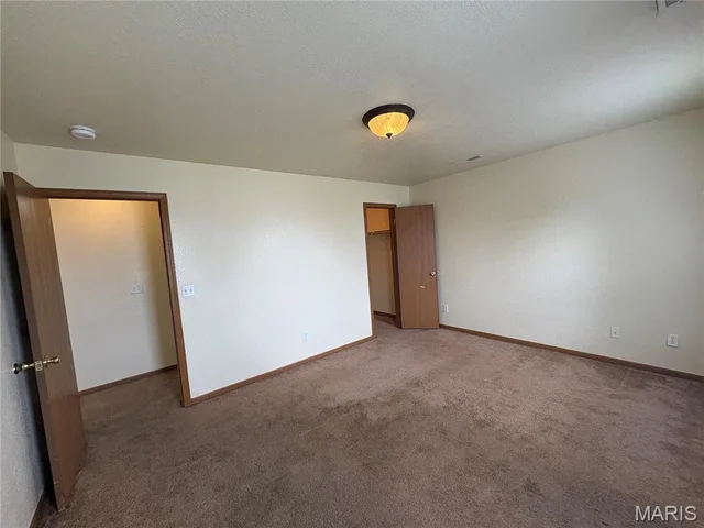 Primary bedroom — 22630 Hollow Oak Lane St Robert Missouri real estate