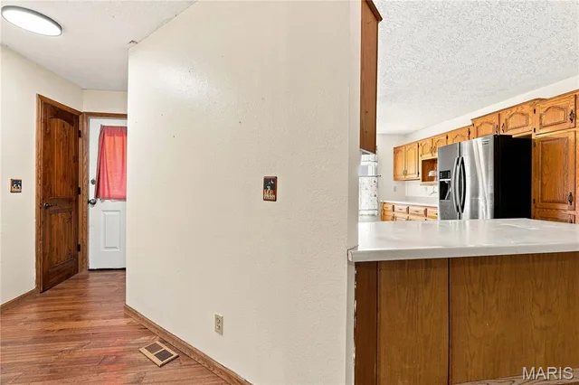Primary bedroom — 30301 Peach Blossom Lane Lebanon Missouri real estate