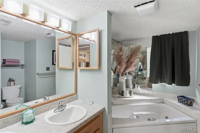 Primary bedroom — 343 Racquet Club Drive Lake Ozark Missouri real estate
