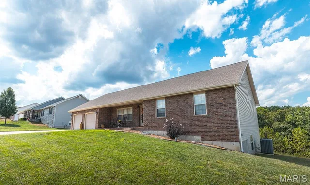 Primary bedroom — 110 Paradise Street Waynesville Missouri real estate