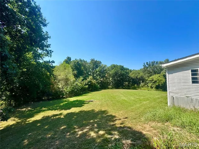 Primary bedroom — 154 Country Drive Winfield Missouri real estate