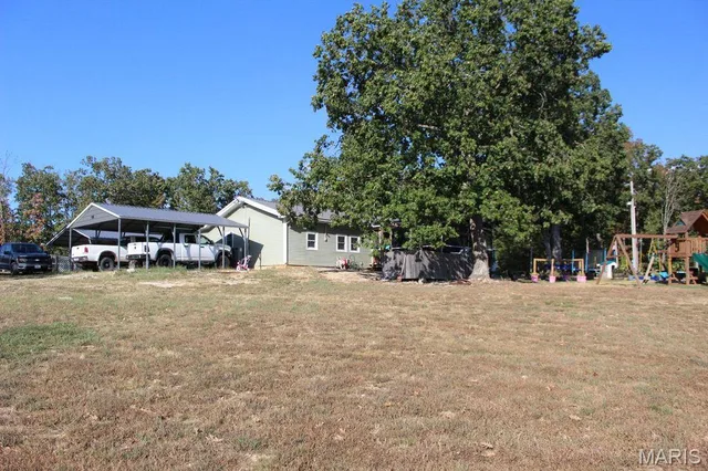 Primary bedroom — 18400 County Road 7520 Newburg Missouri real estate
