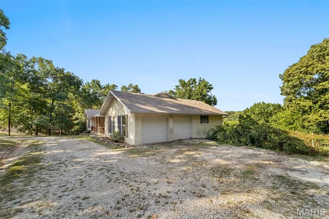 Primary bedroom — 11741 County Road 385 Holts Summit Missouri real estate