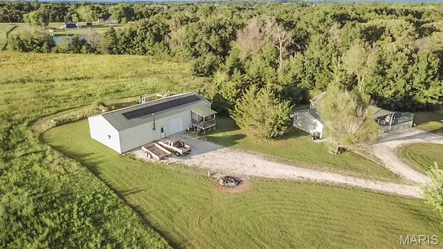 Front exterior — 20465 Monroe Road 455 Stoutsville Missouri real estate