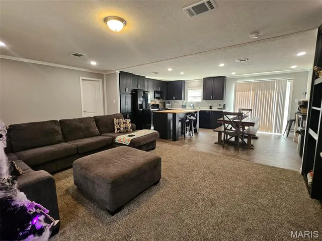 Living room — 607 W School St. Crocker Missouri real estate
