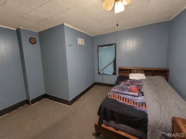 Primary bedroom — 212 W Pulaski Street Richland Missouri real estate