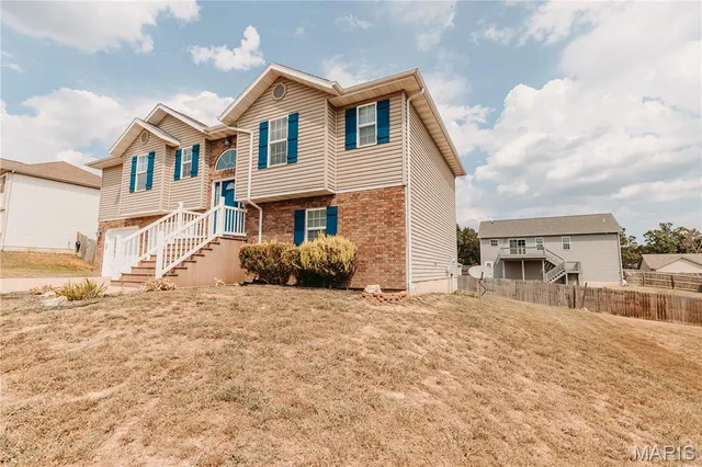 Primary bedroom — 22961 Revelation Road Waynesville Missouri real estate