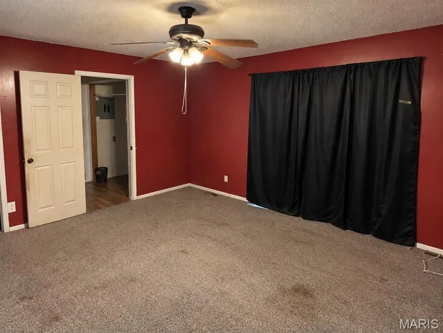 Primary bedroom — 412 Sunset Drive Waynesville Missouri real estate